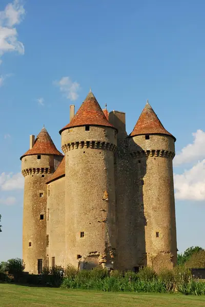 The Château de Sarzay with its machicolated towers
